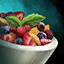 Bowl of Fruit Salad with Mint Garnish